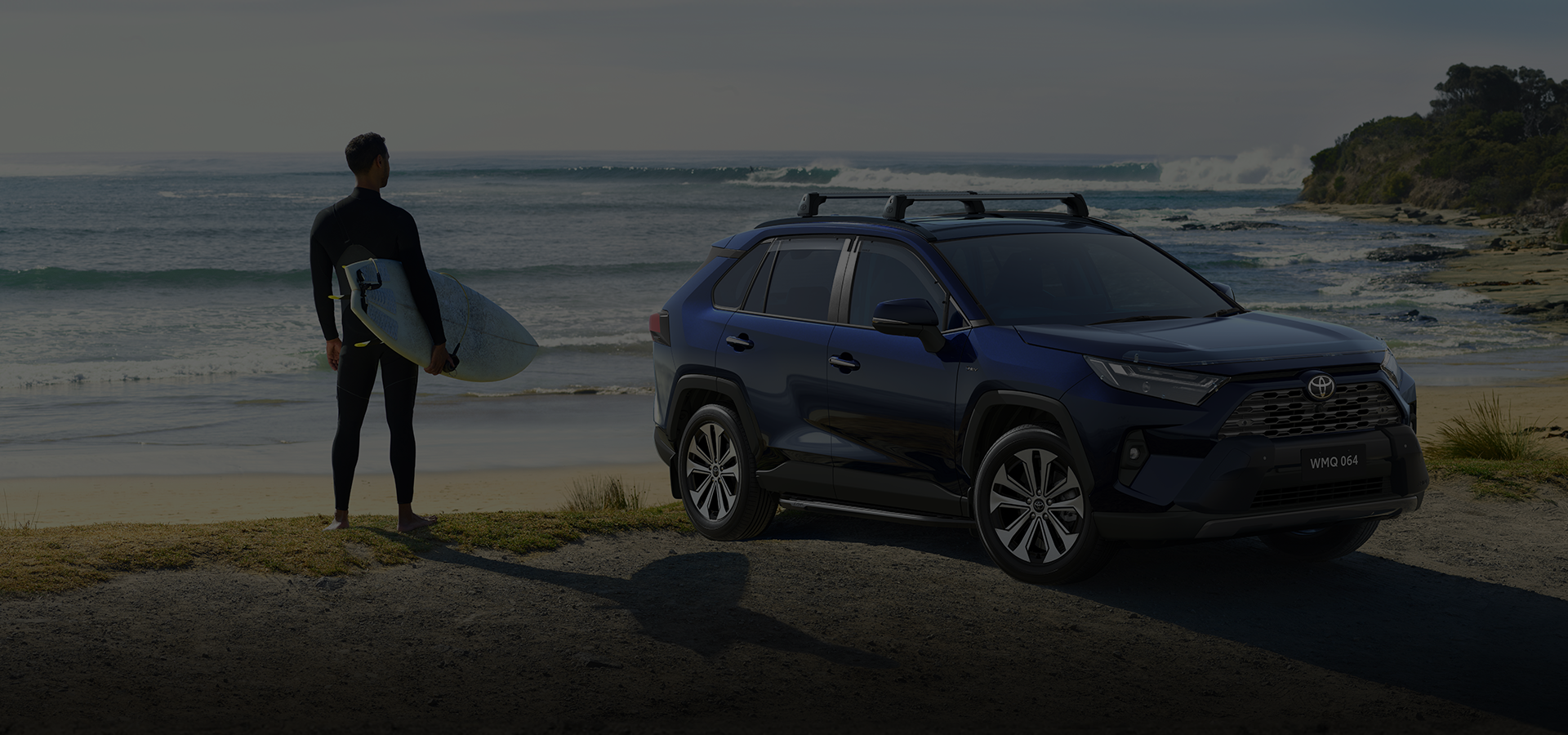 Toyota vehicle on a coastal road representing Toyota Finance Australia incentive program results